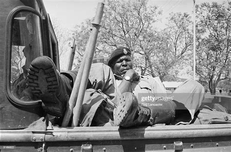 A Soldier Of The 1st Rhodesian African Rifles Sprawls In The Back Of