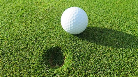 How To Repair A Golf Ball Divot On The Putting Green Golf Chilled