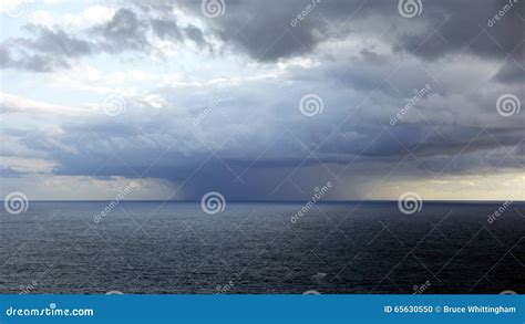 Localised Rain Storm Over Ocean Stock Photo Image Of Clouds