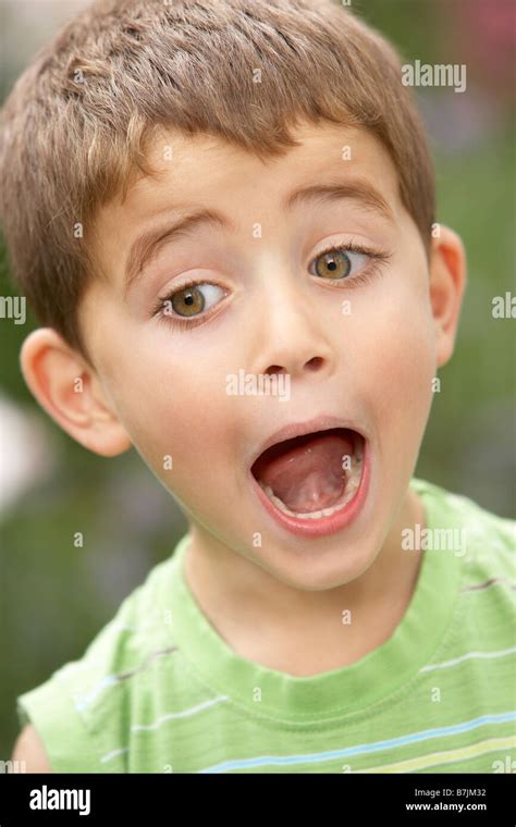 Portrait Of Young Boy Looking Surprised Stock Photo Alamy