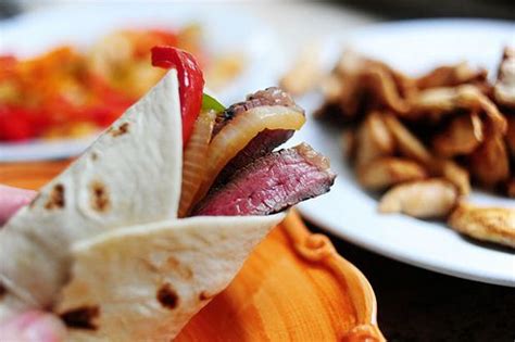 Place chicken strips into a large resealable plastic bag; Pioneer Woman Beef and Chicken Fajitas | Pioneer woman ...
