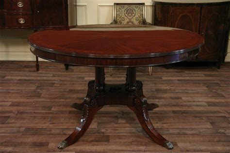 Curved pedestal base dining table with 12 in. 54 Round to Oval Mahogany Dining Table with Leaves | eBay