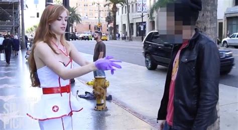 Woman Dressed As Sexy Nurse Gives Testicular Exams In Publicbut Dont Worry Its For