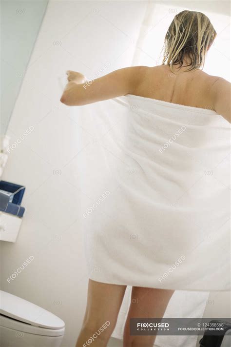 Woman In White Towel In A Bathroom Authentic Body Image Stock