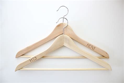 To pull a hanger you must suffle untill you find a card that is high in value and leave it on the bottom of the deck and keep shuffling untill there is two in a row. Wood Burned Clothes Hangers