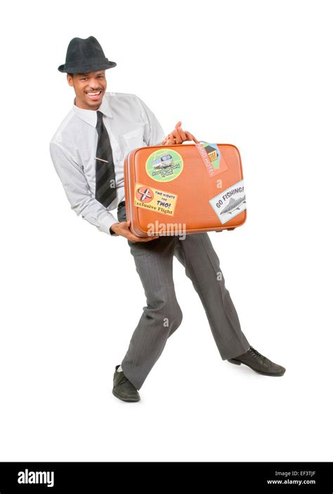 Happy Man Holding A Suitcase Stock Photo Alamy