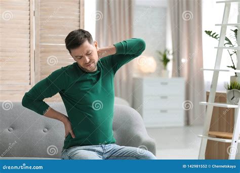 Young Man Suffering From Back Pain Stock Photo Image Of Inflammation