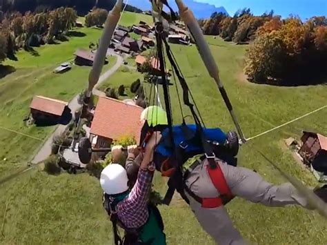 Hang Glider Desperately Clings On After Pilot Forgets To Attach Him In