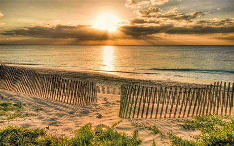 Early Morning Sunrise At The Beach