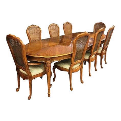 I believe it is a thomasville dining room table. Vintage Thomasville French Court Dining Table & Chairs ...