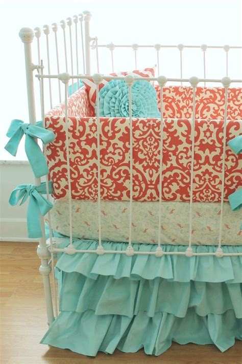 It's all about the boho, baby! Coral crib bedding. Love these colors! Girl nautical ...