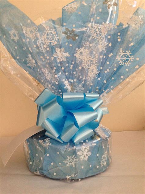 Highlight Printed Cellophane With A Coloured Tissue Wrap Present