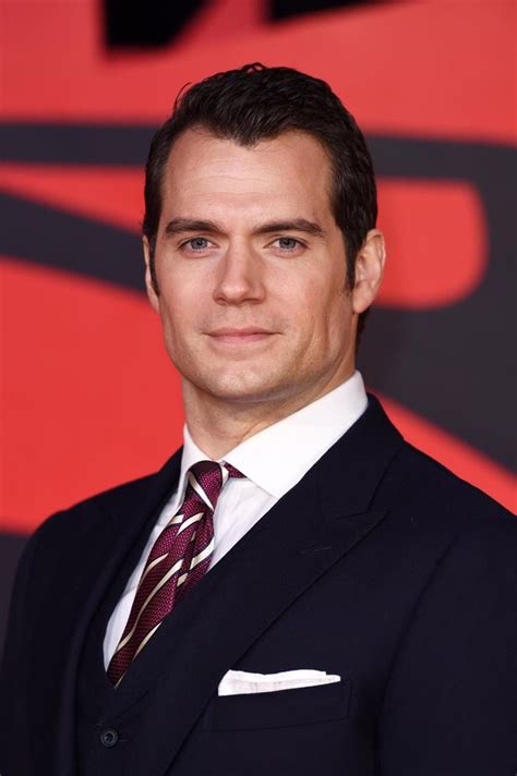 henry cavill poses with 19 year old girlfriend and mum at batman v superman premiere in london