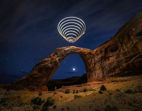 Light Cone Spacetime Sculpture Over The Cornona Arch In Moab Utah