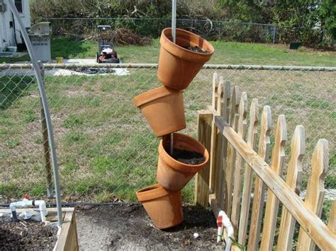Vertical Clay Pot Tower Planter For Flowers And Herbs The Homestead