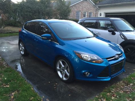 A backup camera can be had on 2012 ford focus models equipped with the technology package, which also included front and rear parking sensors. 2012 FORD FOCUS TITANIUM 5-DOOR HATCHBACK CANDY BLUE ...