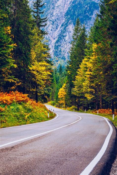 Mountain Road Landscape With Rocks Sunny Sky With Clouds And