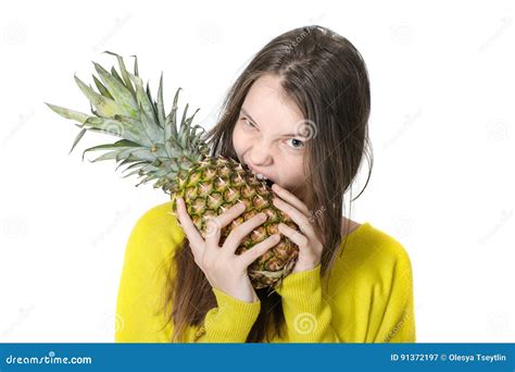 Young Girl Bites Into A Large Ripe Pineapple Stock Image Image Of Food Detox 91372197