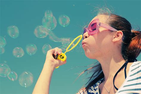 Pretty Girl Blowing Bubbles Stock Photo Image Of Outside Outdoors