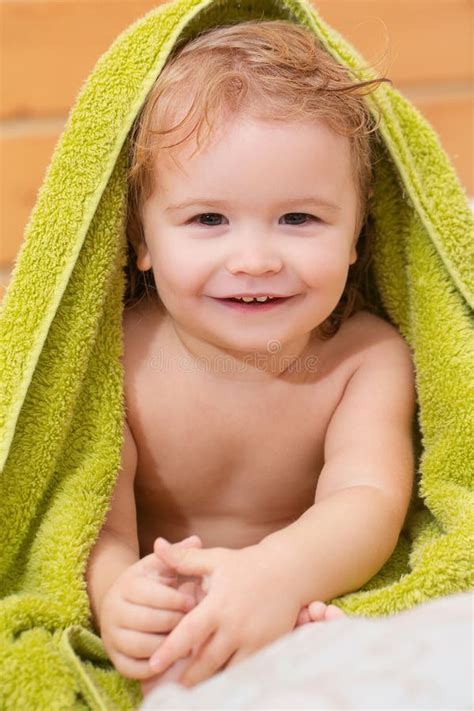Baby Boy Having Bath In Bathing Cap Stock Photo Image Of Hands