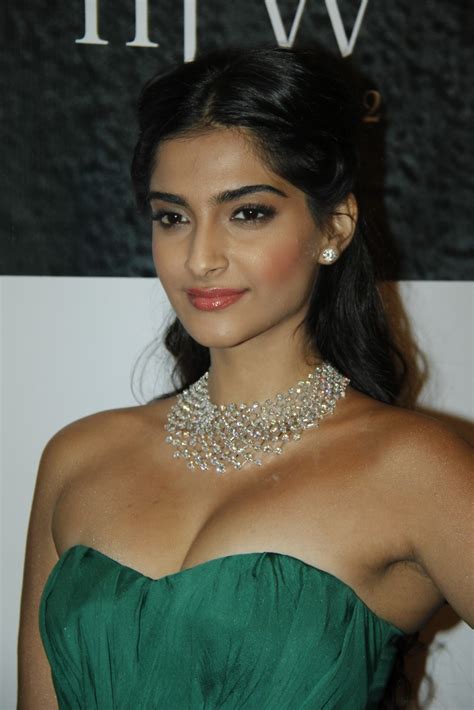 high quality bollywood celebrity pictures sonam kapoor hot cleavage show in green dress at the