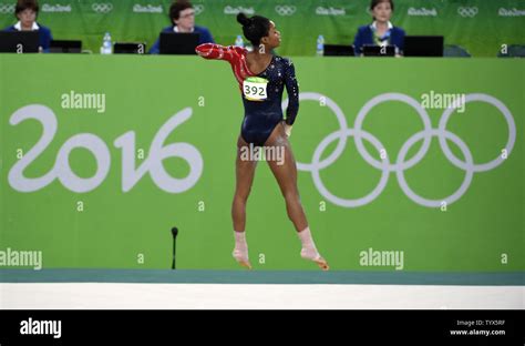 American Gymnast Gabby Douglas Performs Her Routine In The Floor Exercise During The Women S