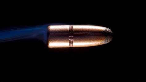A bullet fired from a rifle, such as the 1903 springfield, k98 mauser or smle can travel about 2600 to 2800 ft per second. How far can a bullet travel?