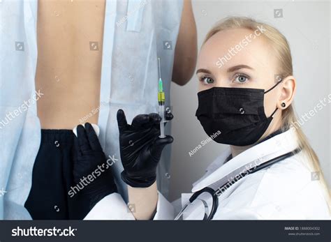 An Orthopedic Surgeon Gives An Injection In The Royalty Free Stock