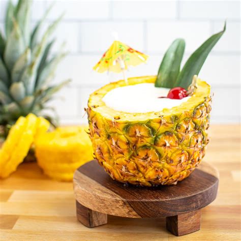 piña colada in a pineapple recipe pineapple pineapple cocktail recipes fresh pina colada