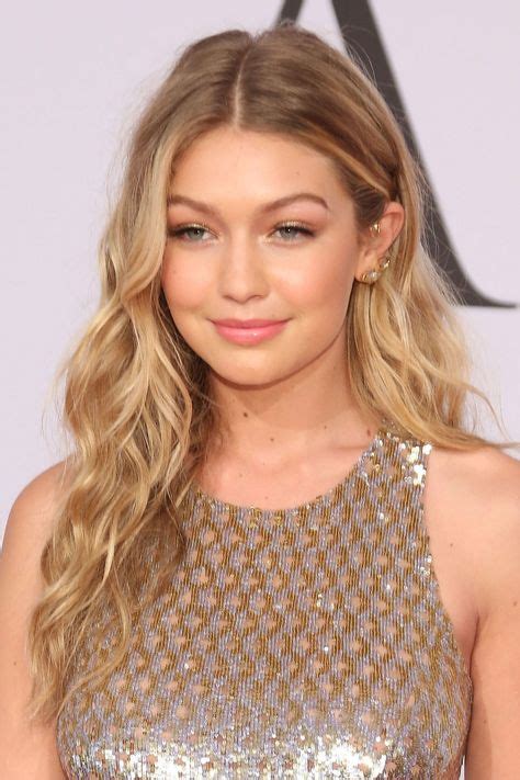 gigi hadid buttery blonde with root smudge honey hair color golden blonde hair