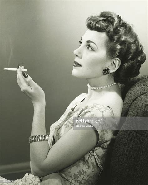 Elegant Woman Smoking Cigarette Posing In Studio Portrait High Res