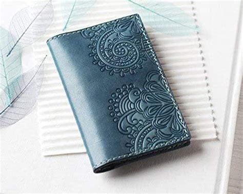 Jan 06, 2021 · the women's card holder wallet measures 7.87 inches by 3.93 inches by 0.79 inches and offers 25 card slots, 1 id window and 1 large zipper pocket, which can hold your iphone 7, large bills, multi cards, chequebook and paper money. Amazon.com: Blue Leather Business Card Holder - Card Wallet for Women - Hand Painted Tooled ...
