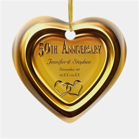 An Ornament Shaped Like A Heart With The Words 50th Anniversary On It