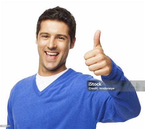 Handsome Young Man Gesturing Thumbs Up Isolated Stock Photo Download