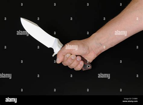 Skeleton Hand Holding Knife