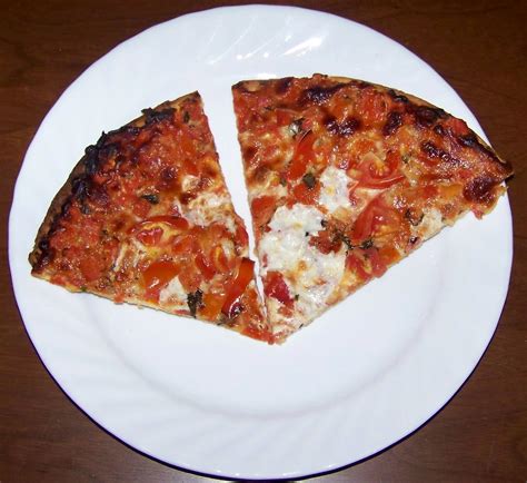 The positives center on the size of the slices and pizza you get for the price. Costco Cuisine: July 2010