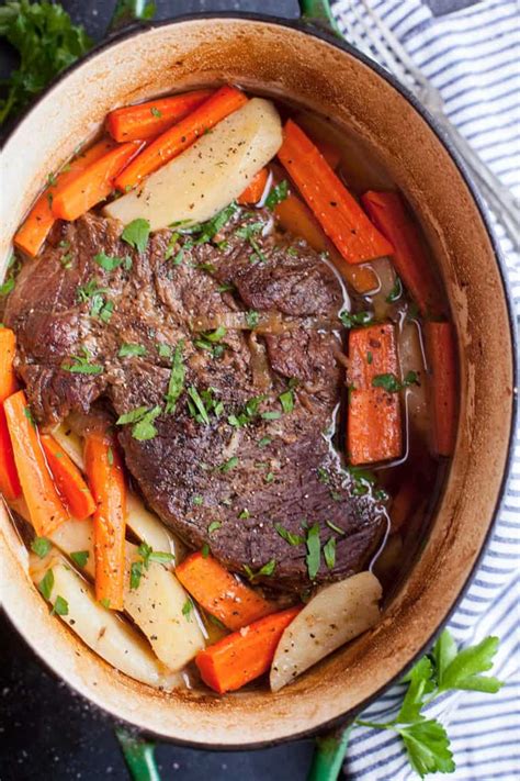 A beef sirloin roast along with cooked potatoes and carrots offers immense flavor, aroma, texture and overall satisfaction. Dutch Oven Pot Roast with Carrots and Potatoes | Feast and Farm