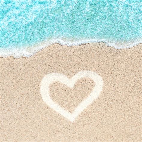Sea Beach And Sand In Summer Day With Love Heart Shape Sign On Stock