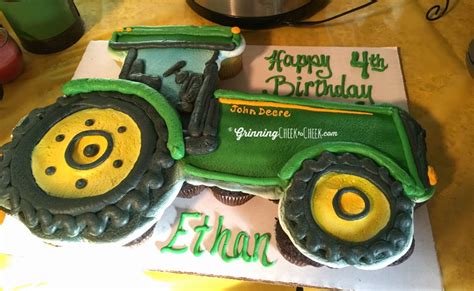 I used wheat grass as decor and for the centerpieces on top of adorable custom blue and white table cloths. John Deere Tractor Themed Birthday Party Ideas