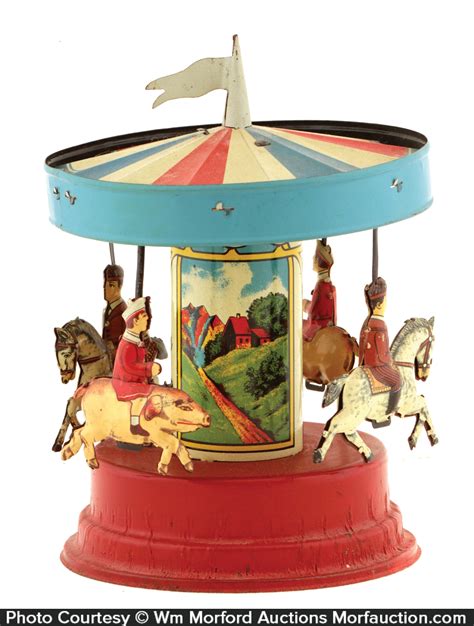 Antique Advertising Carousel Tin Toy • Antique Advertising