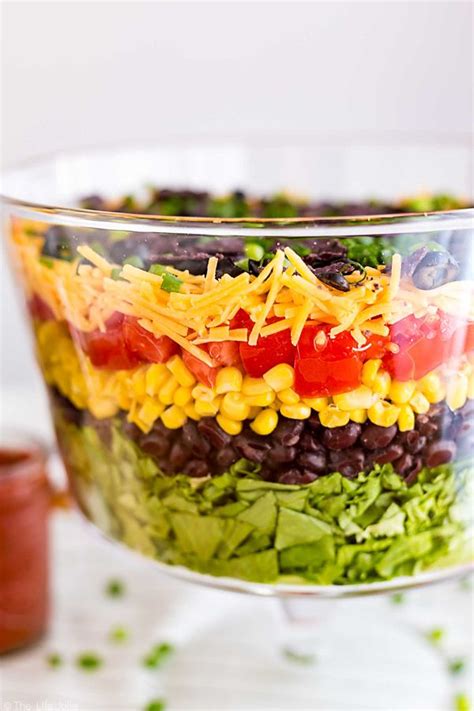 This 7 Layer Taco Salad Is An Easy Recipe To Make For Parties Full Of