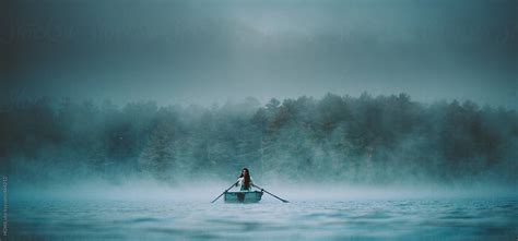Mystical Woman In Row Boat On A Foggy New England Morning By Stocksy Contributor Howl Stocksy