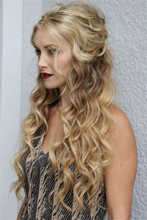 Wavy hair down is the most romantic and one of the most popular hairstyles for brides because this is a timeless and elegant idea that will easily fir any wedding theme and any bridal style. 35 HALF UP HALF DOWN WEDDING HAIRSTYLES IDEAS - My Stylish Zoo