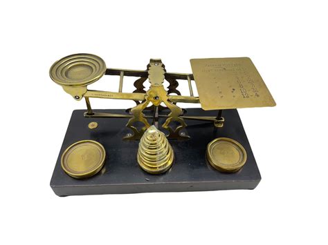 Ds Set Of Sampson Mordan And Co Postal Scales On Ebonised Plinth With