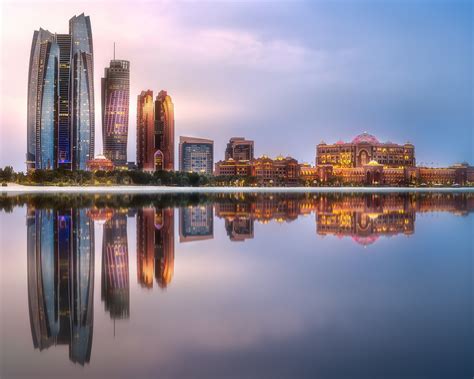 View Of Abu Dhabi Skyline At Sunrise Uae Leeds Guide