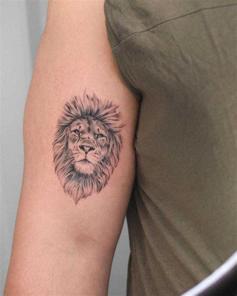 Hyper Realistic Lion Head Tattoo Inked On The Right Arm Small Lion