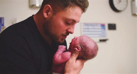 The Heart Warming Moment A Father Embraces His Newborn Son For