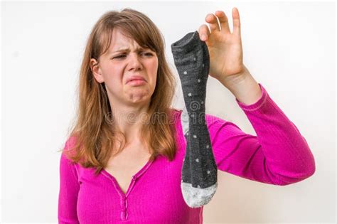 Woman Holding Dirty Stinky Socks Stock Image Image Of Laundry