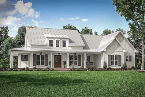 Modern Farmhouse Plan With Large Wrap Around Porch And Rear Entry