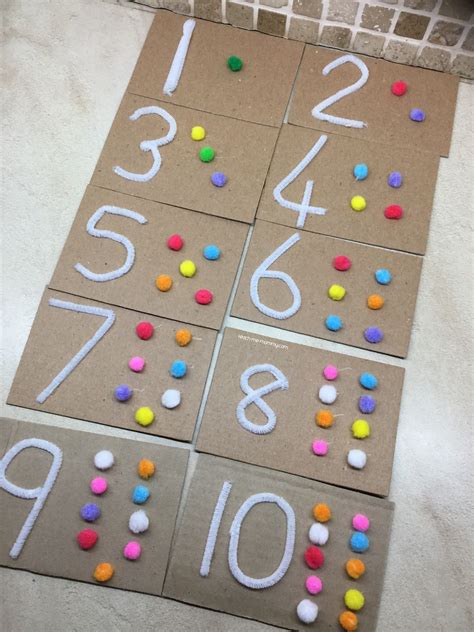 There Are Numbers Placed On A Piece Of Cardboard And Students Have To